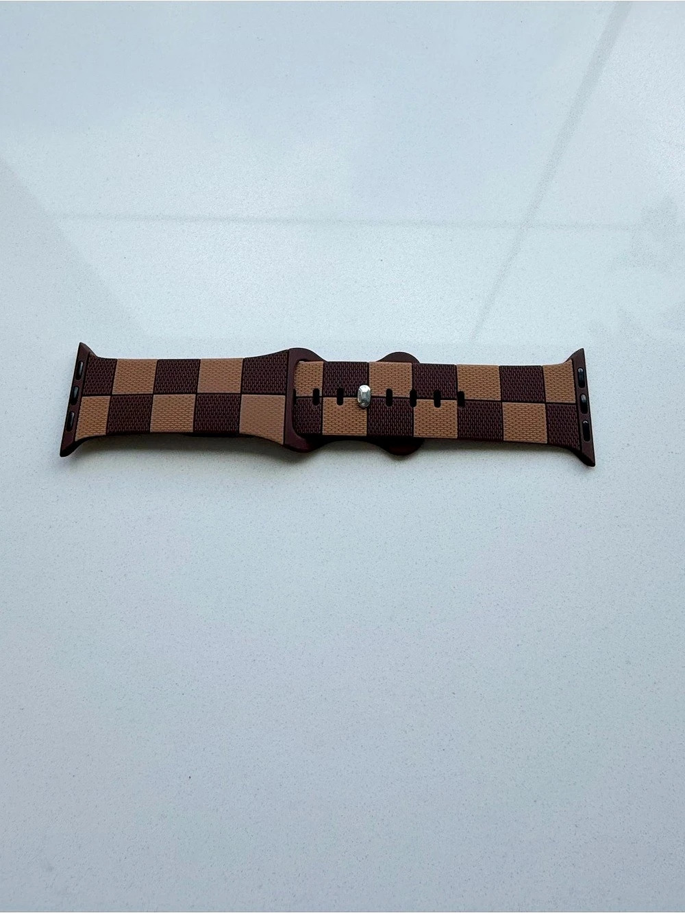 Checkered Apple Watch Band in Brown. New and never used.